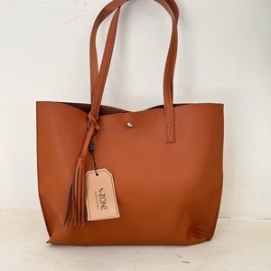 Womens leather tote bag with tassel